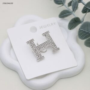 بروش شكل ماركة مع زركون لون فضي