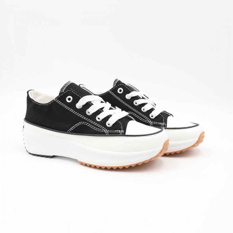 حذاء كاجوال ستاتي نعل عريض لون أسود وأبيض