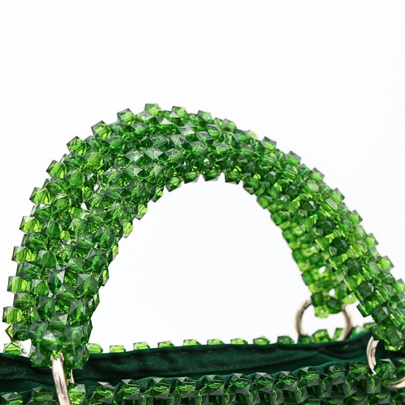 حقيبة كريستال لون أخضر  أبعادها قاعدة 23سم الارتفاع 18سم العمق 8سم