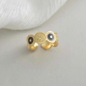 خاتم ذهبي وأسود بتصميم دوائر