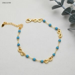 خلخال مع خرز بلون أزرق و شكل انفنتي لون ذهبي