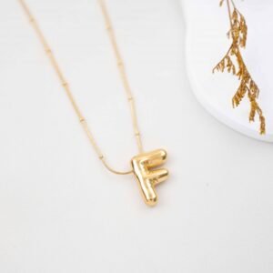 سلسال ذهبي بتصميم حرف F