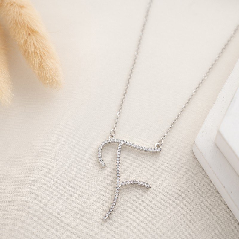 سلسال فضي زركون بتصميم حرف F