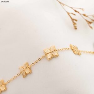 سوار بتصميم وردات لون ذهبي