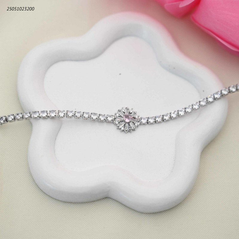 سوار تنس مع بتلة ثلج بالمنتصف لون فضي