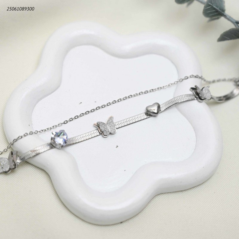 سوار تولاين أفعى مع فراشات متتالية لون فضي