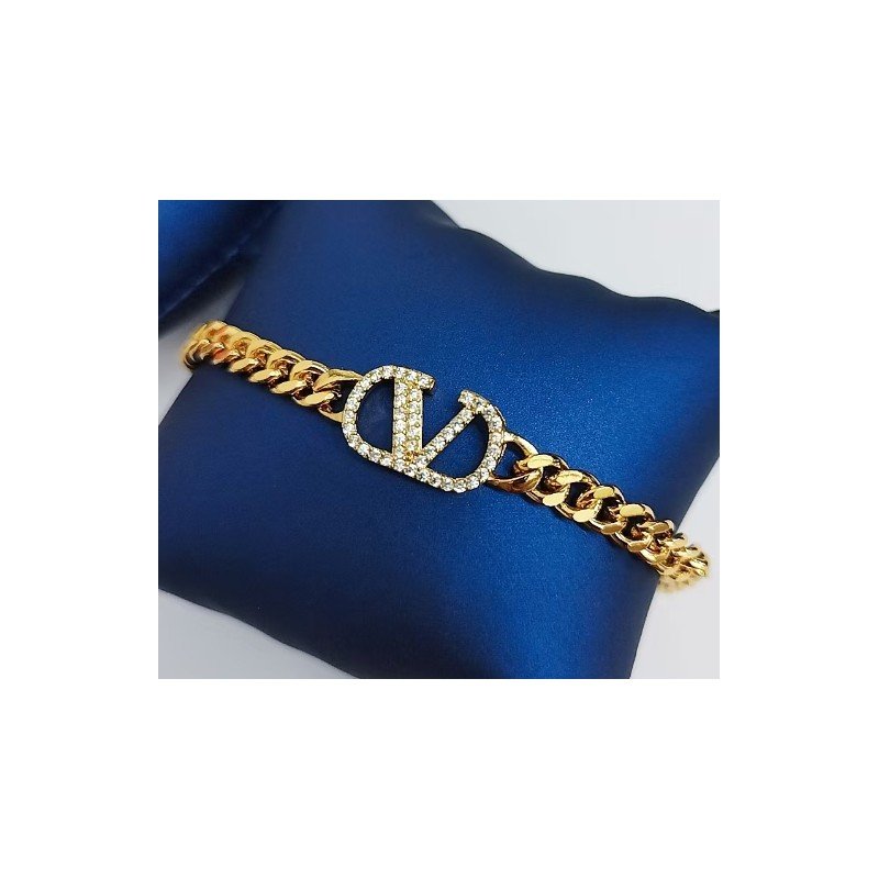 سوار جنزير شكل ماركة لون ذهبي