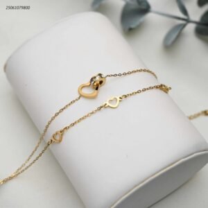 سوار خطين مع شكل قلب لون ذهبي