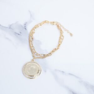 سوار ذهبي بتصميم ليرة مع زركون أبيض