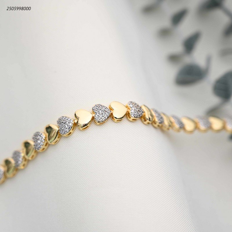 سوار قلوب ذهبية وفضية مرصعة بالكريستال اللامع لون ذهبي