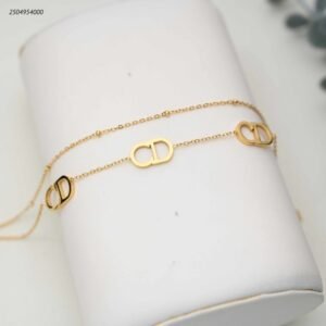 سوار ماركة من حرفي C D متداخلين لون ذهبي