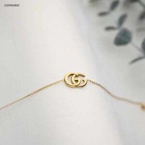 سوار ماركة+حروف GG متداخلة لون ذهبي