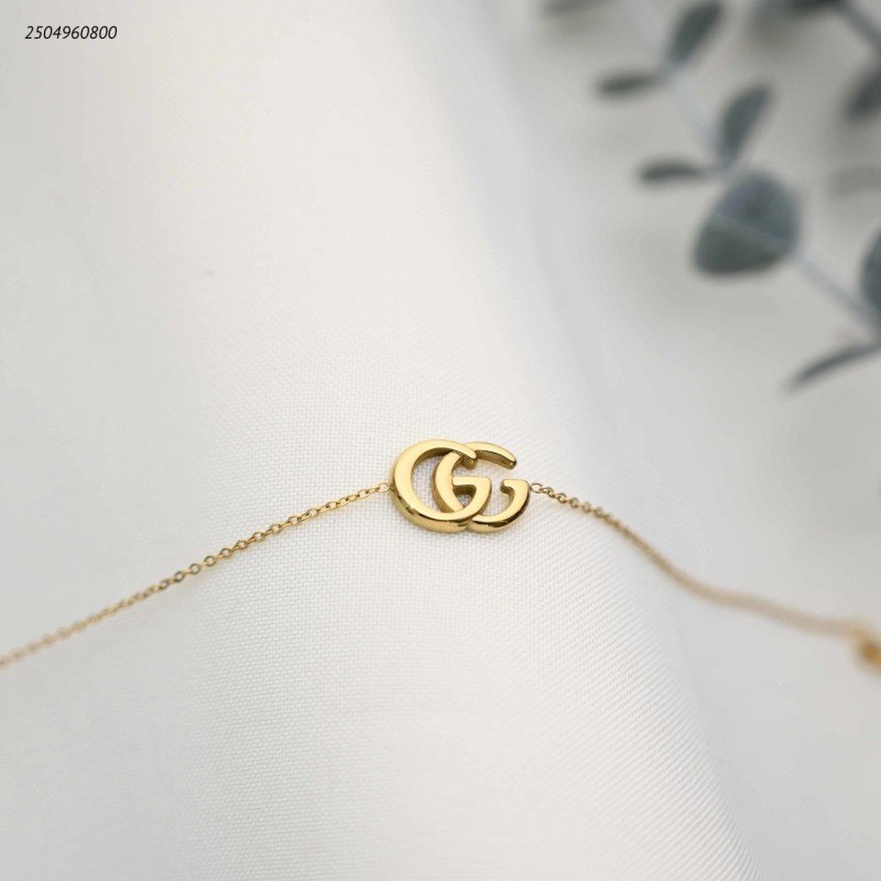 سوار ماركة+حروف GG متداخلة لون ذهبي