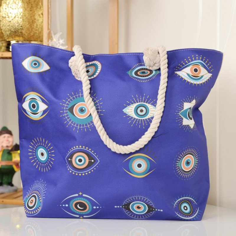 شنطة يد قماش للرحلات بتصميم عيون لون نيلي