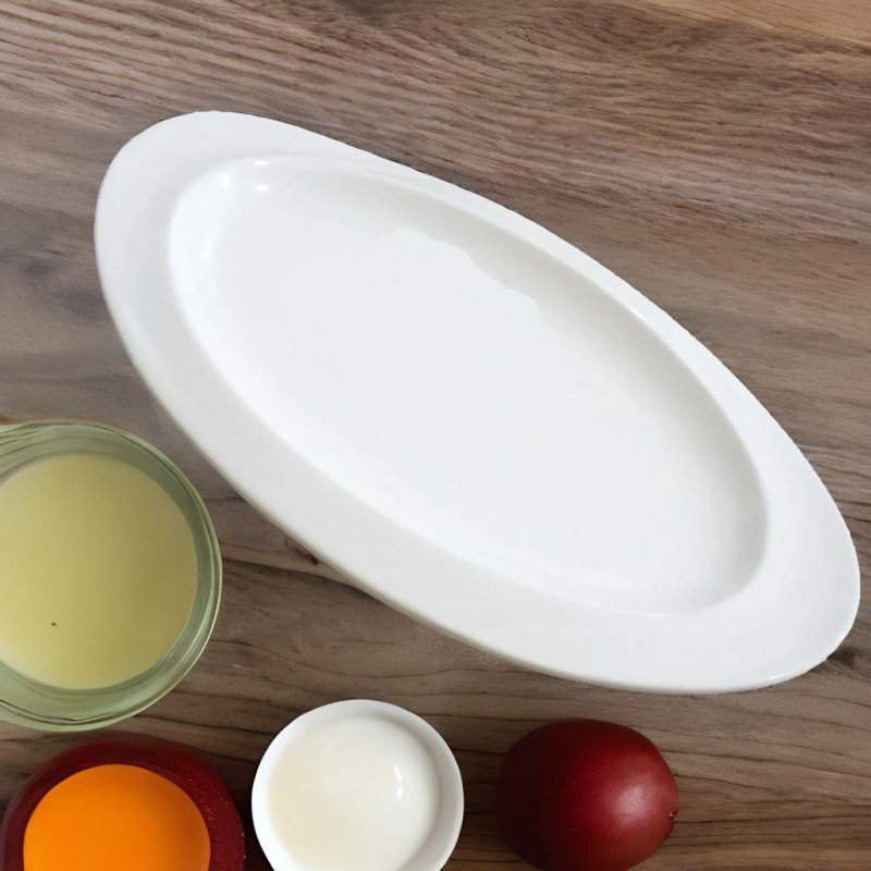 صحن بورسلان بيضاوي لون أبيض قياس 30*21 سم