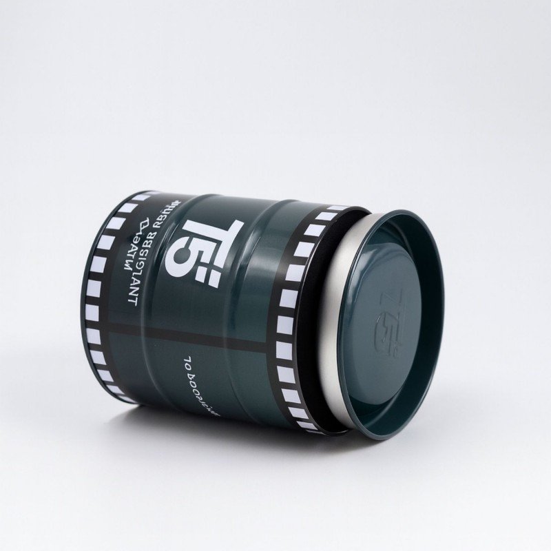 صندوق هدايا معدن شبابي للساعه شكل اسطوانه لون اسكني غامق بتفاصيل أبيض وأسود