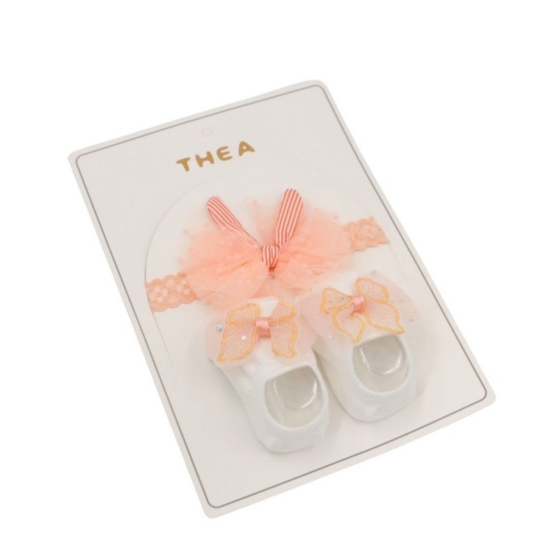 طقم للأطفال قطعتين لون أبيض و مشمشي