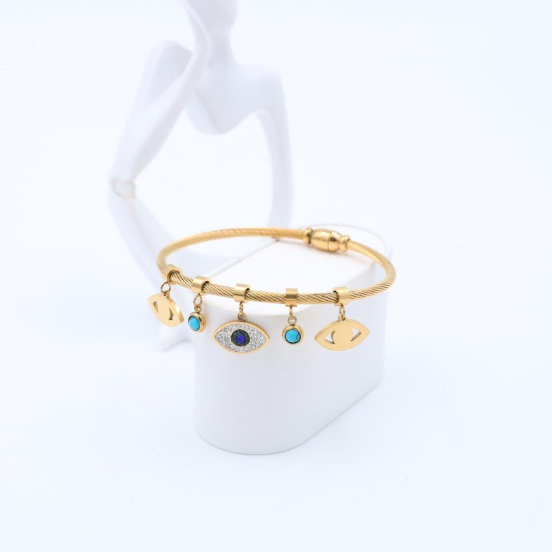 سوار لون ذهبي بتصميم عيون وحجر أزرق