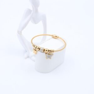 سوار لون ذهبي بتفاصيل فراشات وكرات