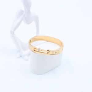 سوار لون ذهبي مع احجار زركون فضي