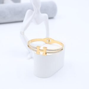 سوار لون ذهبي مع زركون فضي