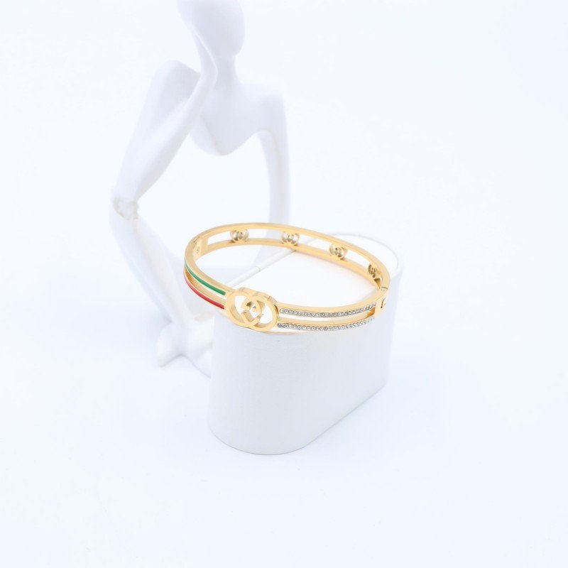 سوار لون ذهبي مع زركون فضي وتفاصيل أحمر وأخضر