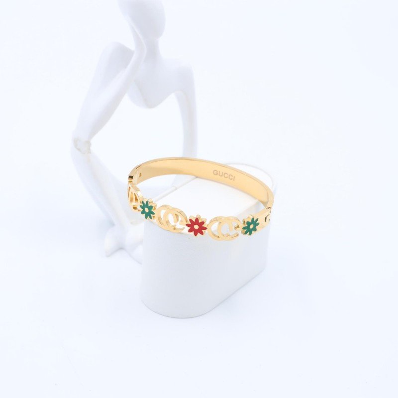 سوار لون ذهبي مع ورود لون أحمر وأخضر