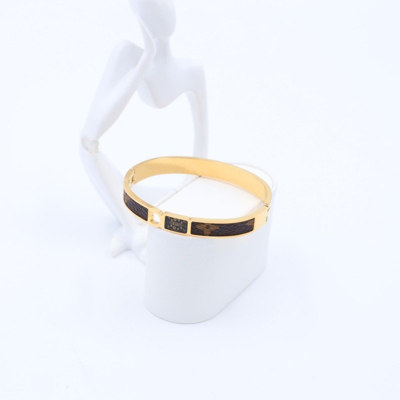 سوار لون ذهبي وفاصل بني