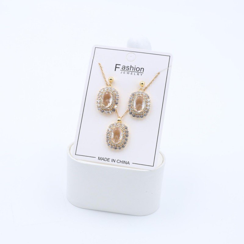 طقم حلق كرستال بتصميم بيضاوي أبيض مع سلسال بتصميم بيضاوي كريستال أبيض لون ذهبي