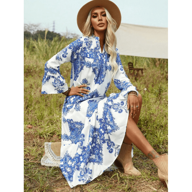 فستان نسائي بأكمام طويلة لون أبيض مزخرف أزرق